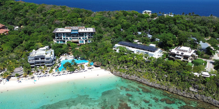 Le resort Kimpton Grand Roatán sur la plage de West Bay, à Roatán